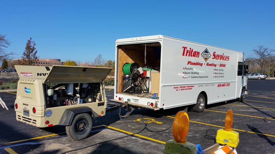 Tritan Services electrician service truck parked in Naperville